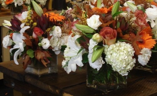 Ivory Brown Orange Wedding By bernardosflowers